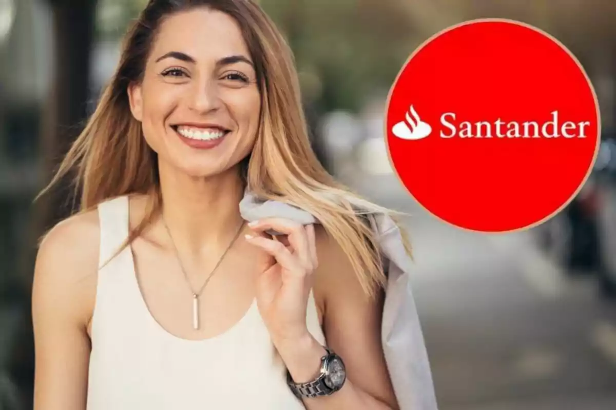 Mujer sonriendo con un logo de Santander en la esquina derecha. Mujer sonriendo con un logo de Santander en la esquina derecha.